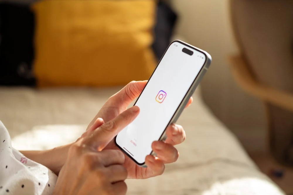 Smartphone showing Instagram search interface representing the platform's shift toward search-based discovery.